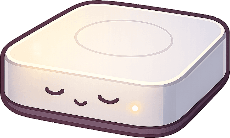 A Mac mini on the desk.